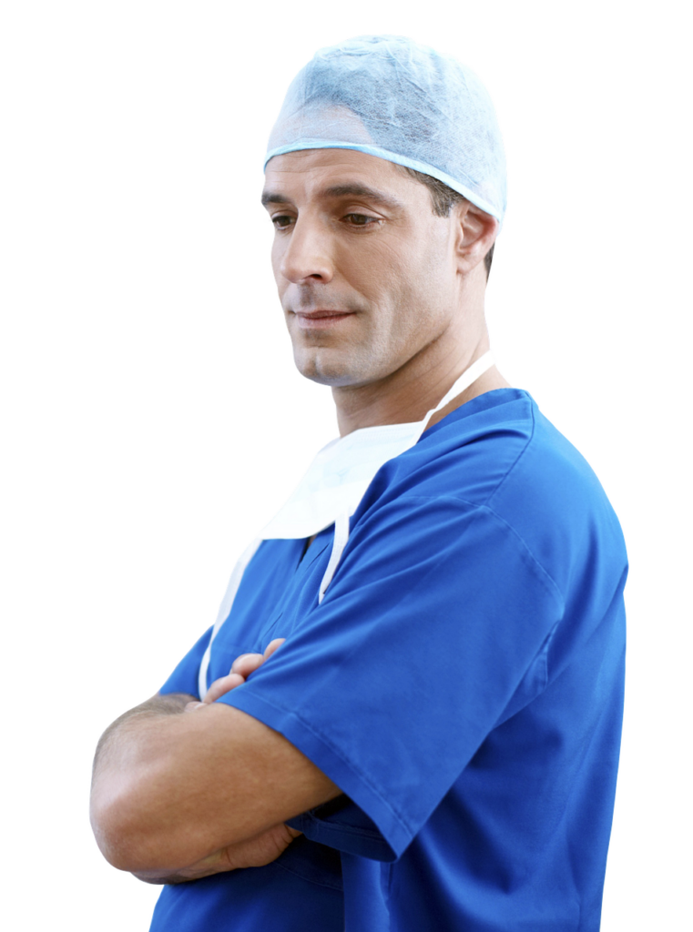 Doctor standing and looking to the side with arms together